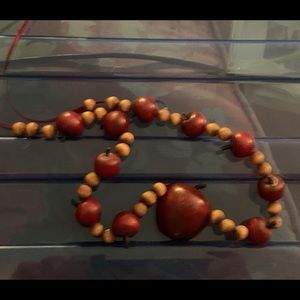 Apple necklace.